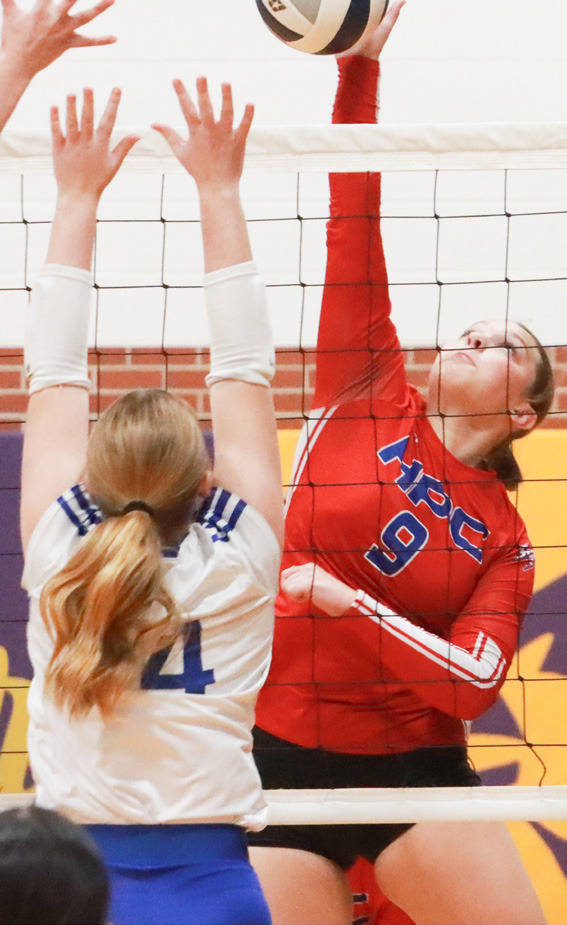 Left-Senior HallieHJo Urkoski with one of her 14 kills in the match with Shelton. Right- Sophomore Ava Lindburg digs up the Shelton serve during first set action at the D2-5 subdistrict in Elba on Monday.PCN photos by Ken Kush