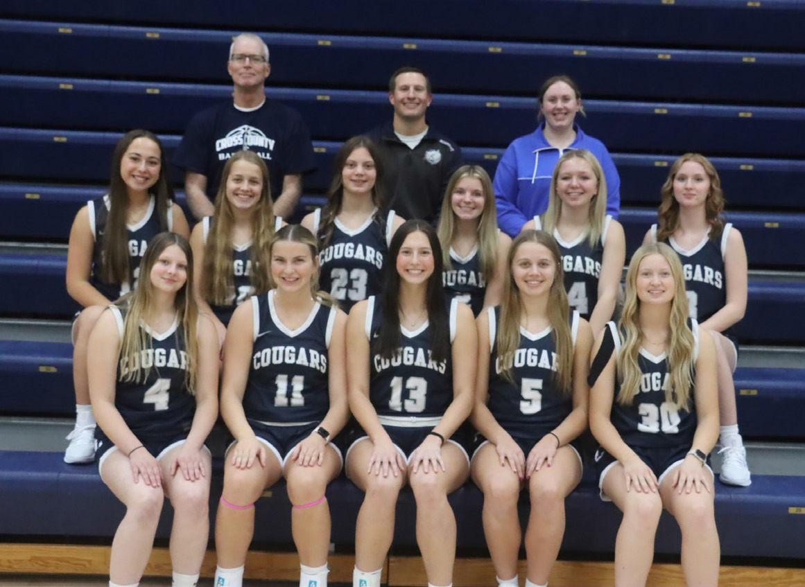 Members of the Cross County Girls Basketball team are; front (L-R)- Beretta Webb, Ella Clark, Adrienne Waller, Eden Peterson, Kelsey Brehm. Row 2- Chloe Johnston, Olive Peterson, Zaldi VonHackewitz, Delainey Cramer, Hadley Larson, Jaelynn Wittgren. Back row- coach Kip Allison, head coach Mitch Boshart, coach Hayley Koch. PCN photo by Ken Kush.