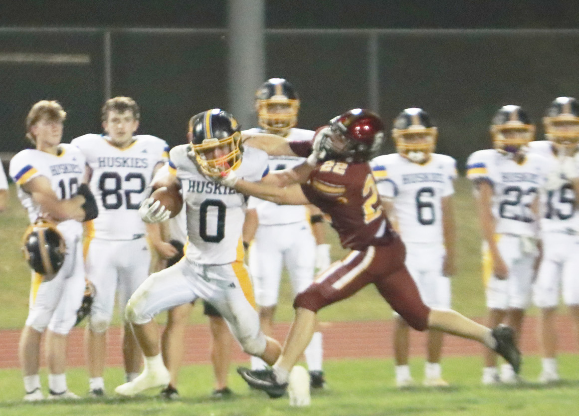 Shelby-RC Huskies senior running back Carter Eickmeier breks free on a 65-yard TD run last in the second quarter on Friday night. Eickmeier carried the ball 23 times for 179 yards and four TD’s in the team 50-29 win over Conestoga. PCN photos by Ken Kush.