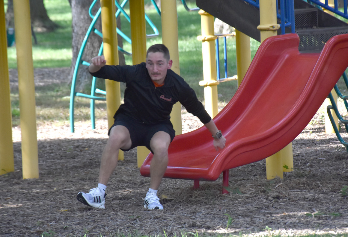 Road rally contestant Calvin Finley makes his way down the slide in Osceola. PCN photo by Beth Sparrow.