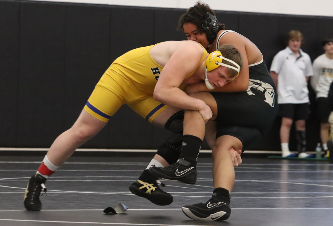 Top- SRC senior Coy Vrbka remained undefeated at 39-0 as he won the 215-pound bracket at the D-3 Meet. 