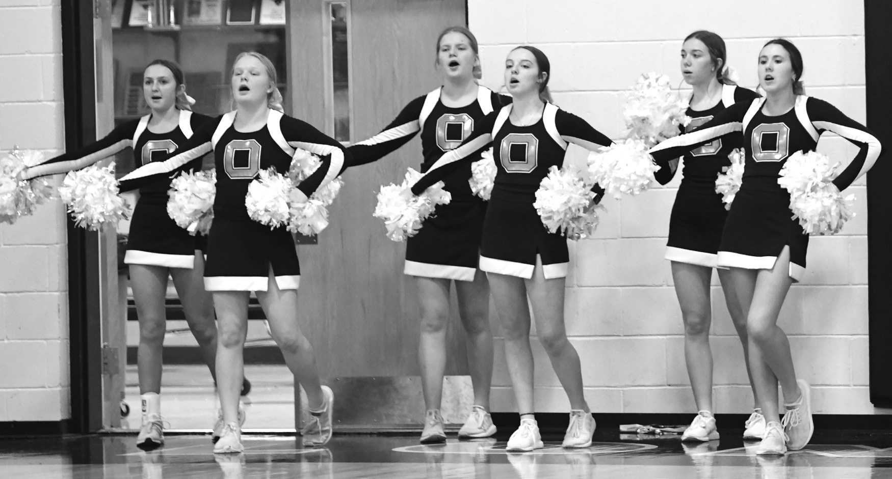 The Osceola Dazzlers hit the road last week to cheer on the Bulldogs. The group was on hand to cheer on the boys basketball team to a 68-21 victory over Dorchester. PCN photo by Rick Holtz