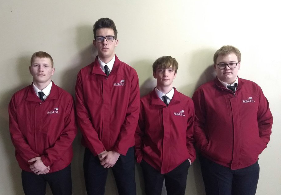 Congratulations to Matthew Reikofski (second from left) for placing 2nd in HVAC and Ty Racek, Matthew, Tony DeWitt and Gage Walker (left to right) for placing 1st in Technical Team Problem Solving with their marble rollercoaster at Skills USA State Leadership Conference! Other competitions were in Criminal Justice, Cabinetmaking, HVAC, and Power Equipment Technology. Photo provided