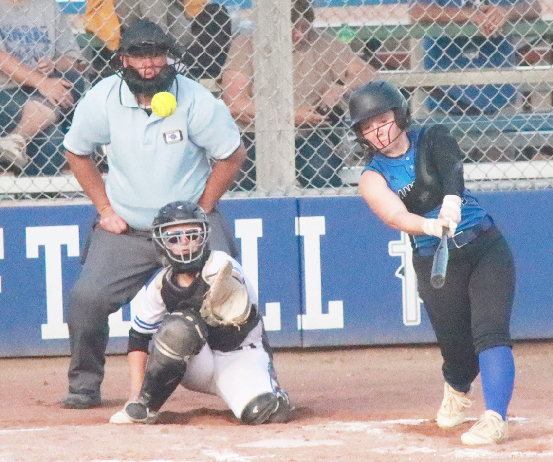 Blue River’s Ashlyn Long ropes a single to right field in the Panthers season opener at Guardian Angels Central Catholic. Long leads the team with a .472 batting average. PCN file photo by Ken Kush.