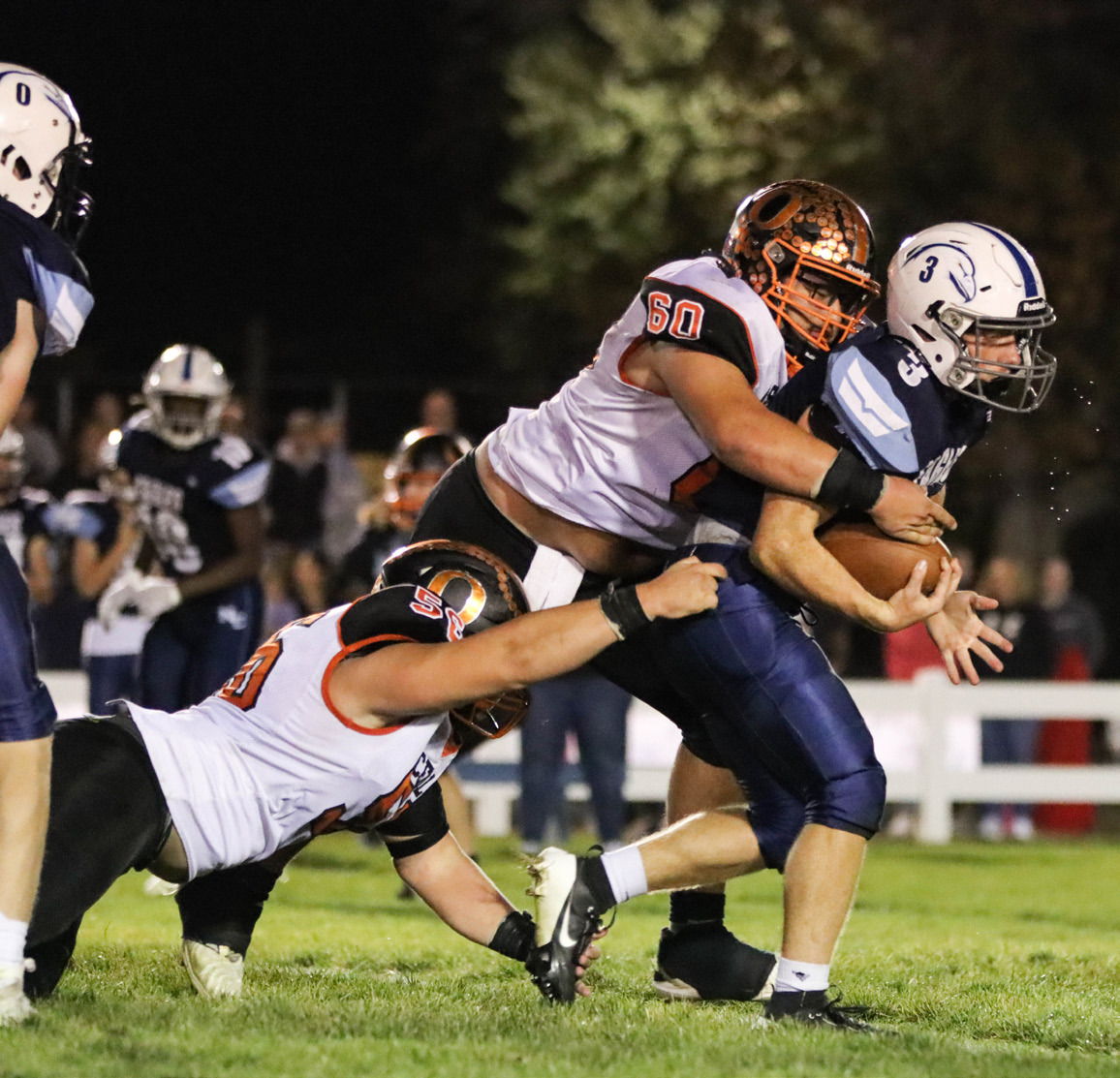 Brenden Gabel makes a tackle for loss of yards with Braylon Peterson’s help. PCN photo by Blaine Winslow.