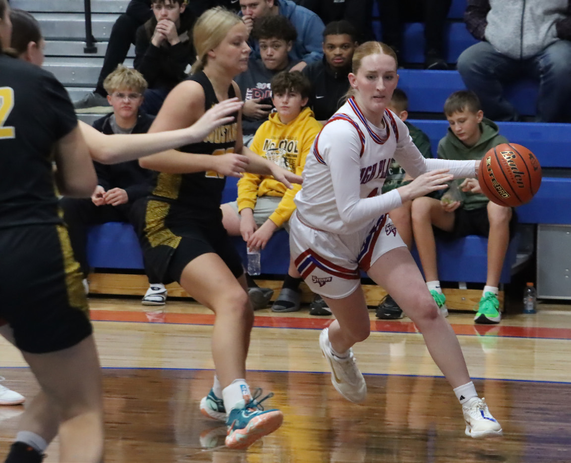 High Plains senior Peyton Hofmann (4) is shown here on the drive down the baseline against McCool Junction earlier this year. Hofmann led the Storm with 14 points in the 65-33 loss to Shelton last Tuesday. PCN file photo by Ken Kush