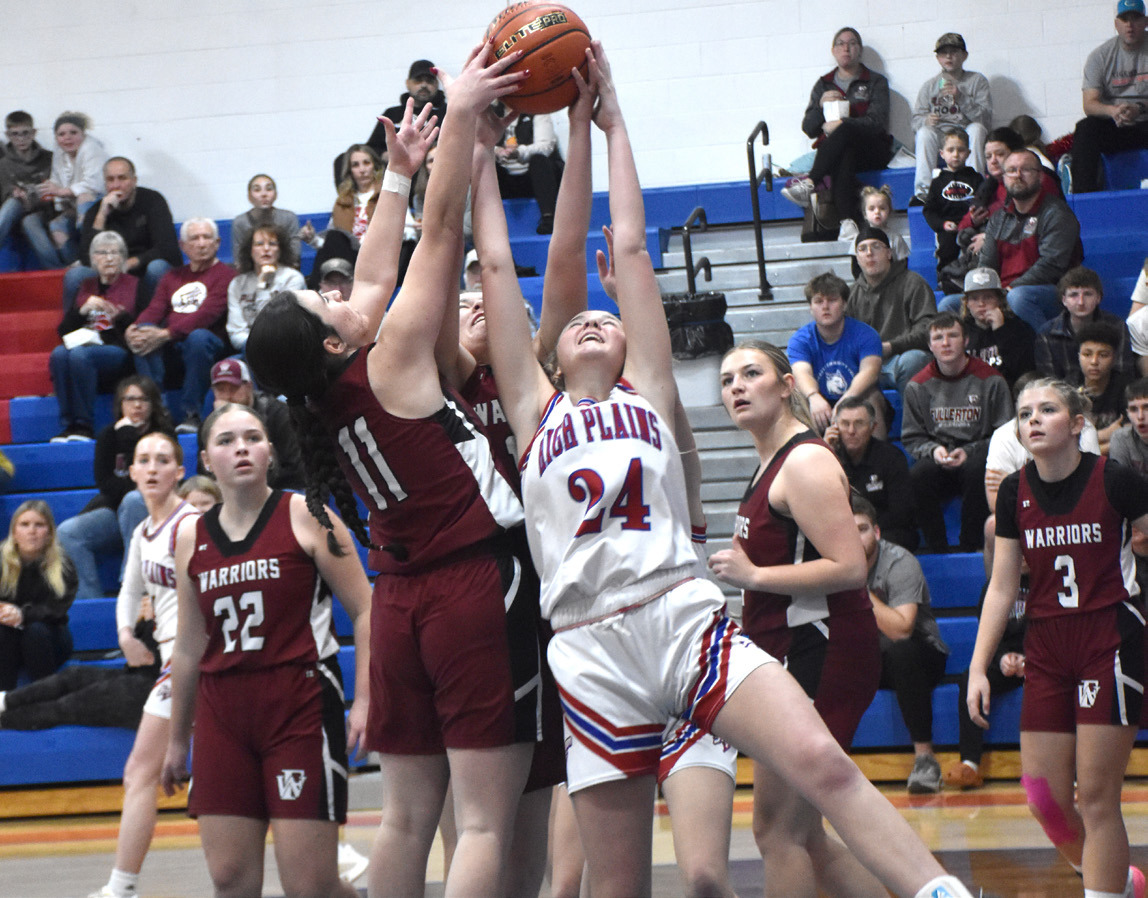 High Plains freshman Taya Hans battles for one of her 13 rebounds and 12 points against Fullerton. PCN photo by Beth Sparrow.