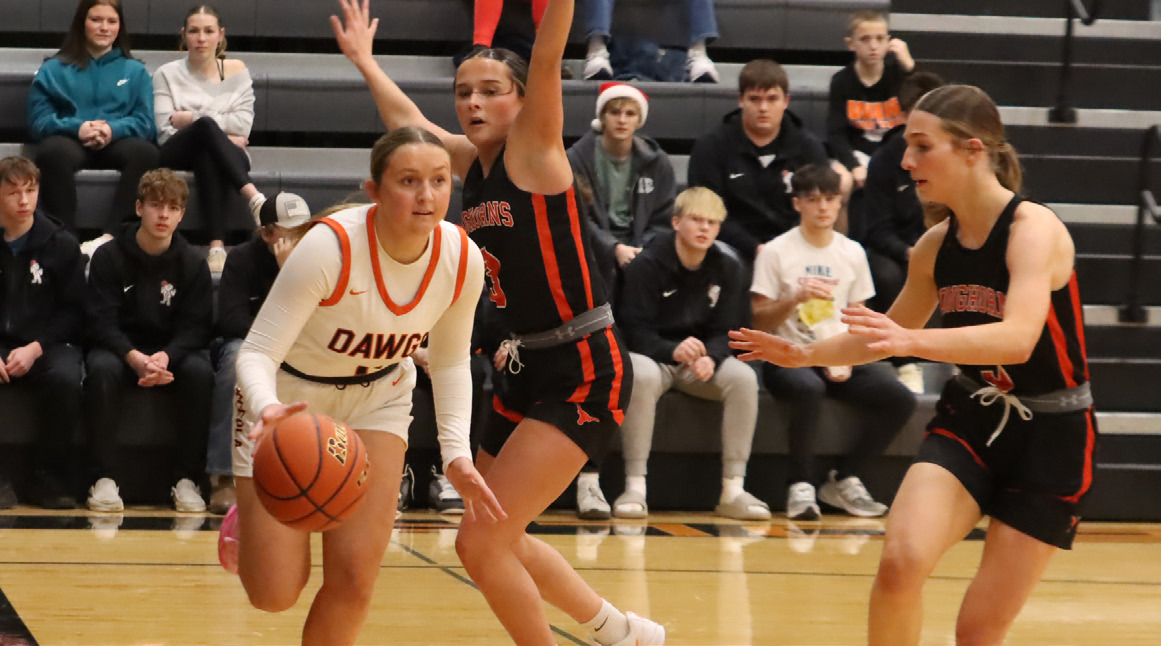 Osceola senior Emersyn Prososki drives the baseline. Prososki scored five points in the win over Dorchester and 23 in the loss to Aquinas. PCN photo by Ken Kush.