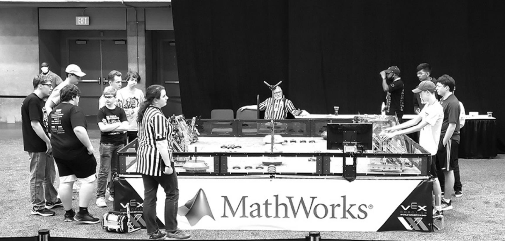 Cross County robotics team 5155A (Hip Hop Anonymous) is at the lower left competing in qualifying rounds. Pictured are team members Ashton Holtzen and Brett Williams, and helper Sam Haug. Photo courtesy of Coach Ben Hackett.