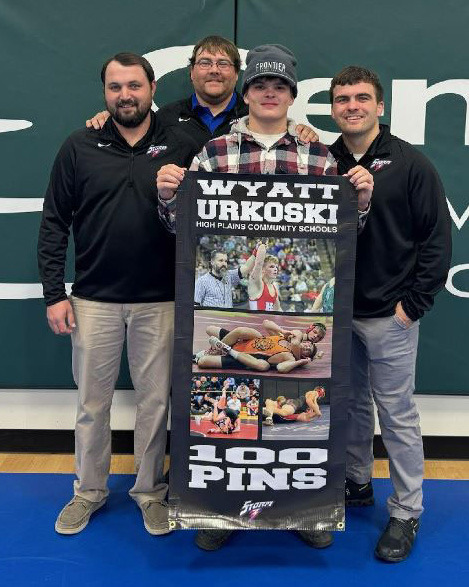 Wyatt Urkoski (senior at High Plains) got his 100th pin at the Norm Manstedt Invitational hosted by High Plains at Central Community College in Columbus. Pictured with him is his coach, Martin Phillips on the right, Corbey Grause (far left) and Jason Church. Photo provided.