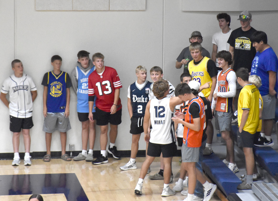 The Shelby-Rising City boys showed up to support the volleyball team at Cross County last Thursday. PCN photo by Beth Sparrow.