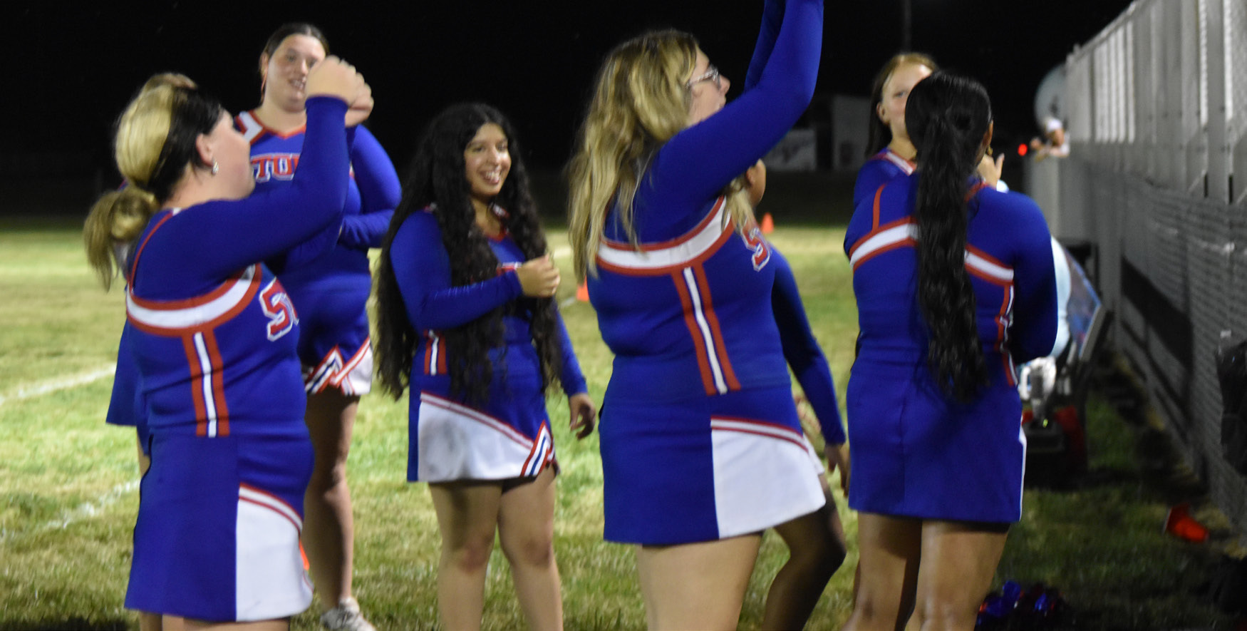 The High Plains Storm Cheerleaders fire up the crowd during halftime of Friday night’s game in Clarks between the Nebraska Lutheran Knights and the High Plains Storm. The Storm rolled to their second win in as many games. PCN photo by Beth Sparrow.