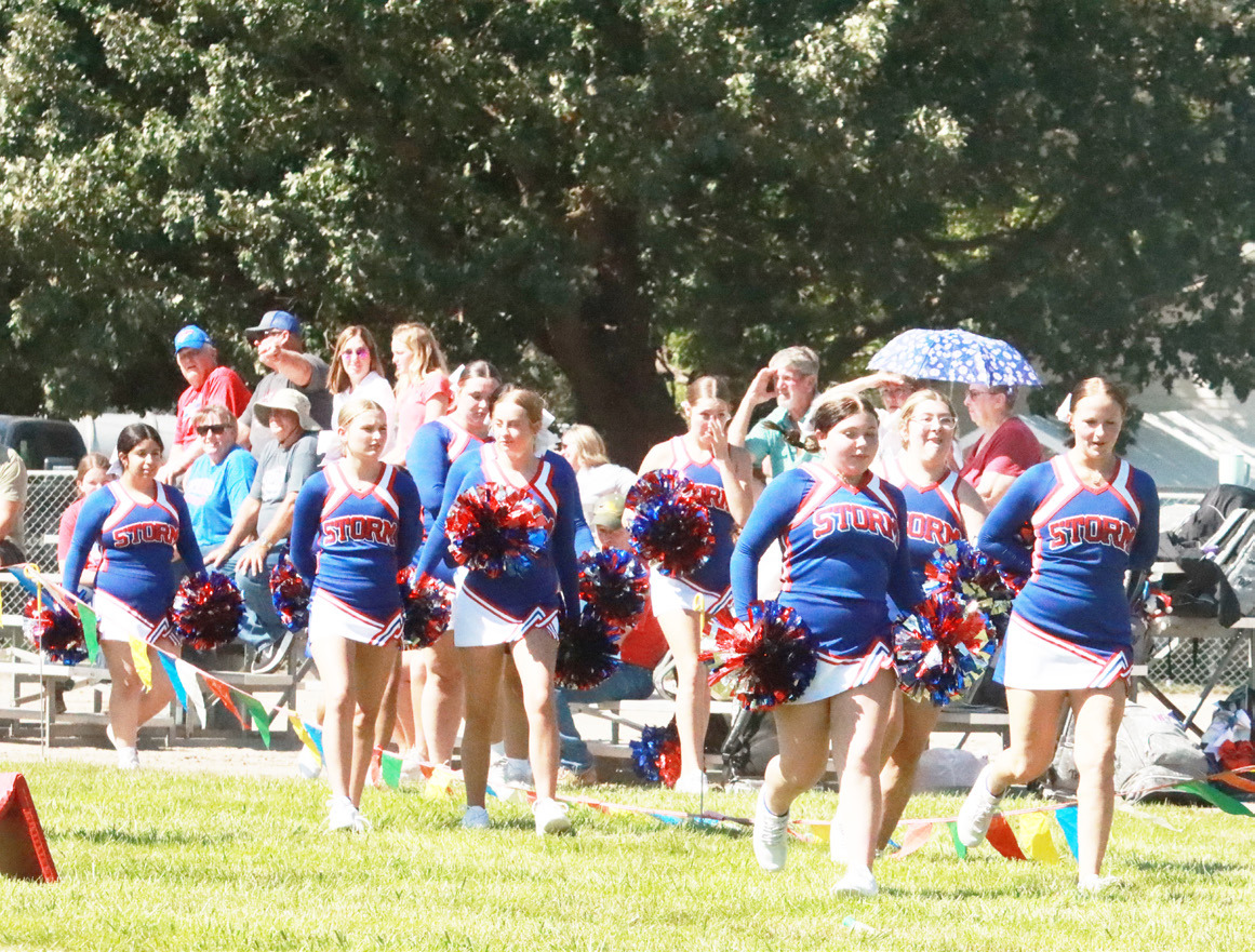 The High Plains Cheerleaders were out in force on a hot muggy day in Elba to cheer on the Storm football game in their six-man debut a 58-0 win. PCN photo by Ken Kush.