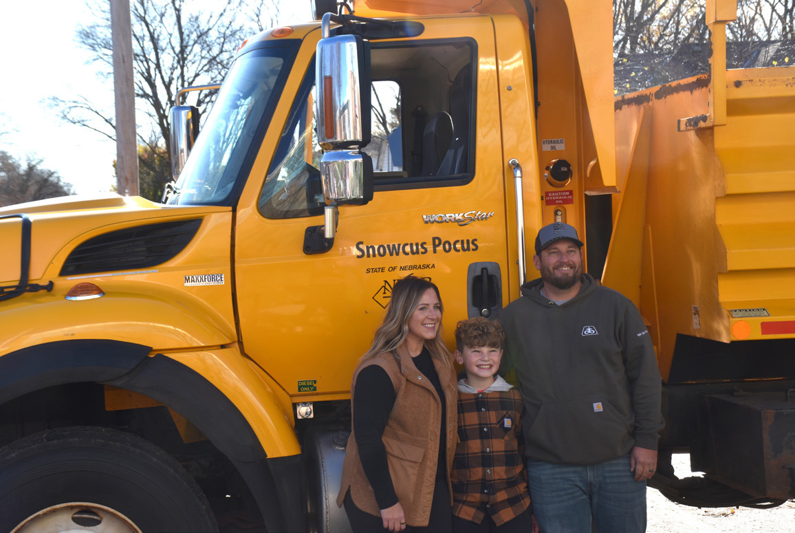 Collin Brockevelt (above with his parents), a 3rd grader at High Plains Elementary won the Name A Snowplow contest sponsored by the Nebraska Department of Transportation. He was recognized at school on Tuesday for the name “Snowcus Pocus”. PCN photos by Beth Sparrow.