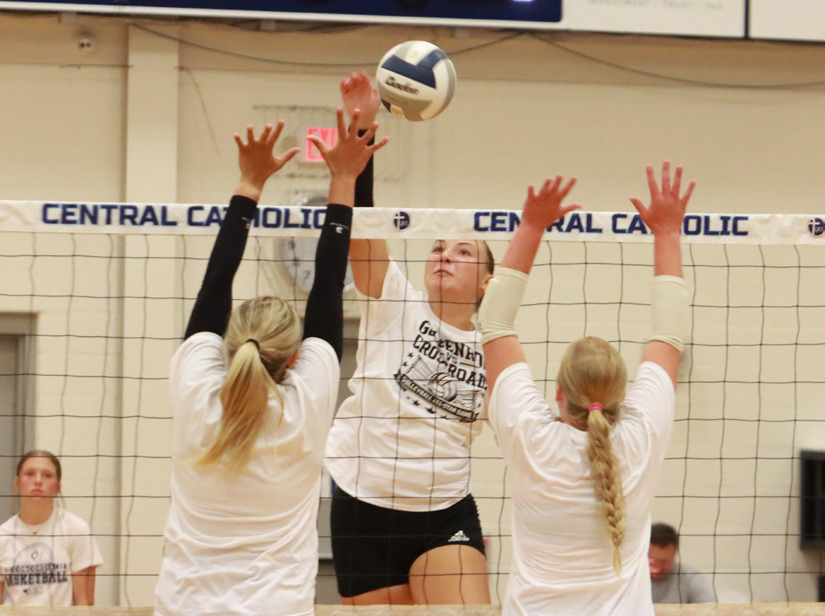 Osceola’s Graci Conkling hammers the kill through the potential block set up by the Goldenrod Conference in Saturday’s game at GICC. Conkling was unofficially credited with 11 kills. PCN photo by Ken Kush.