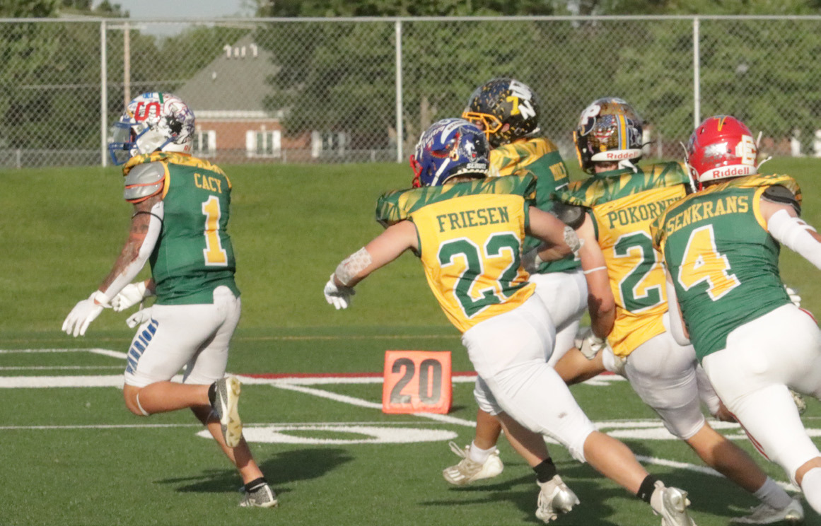 Above-High Plains Storm Gage Friesen (22) is in pursuit of the West kick returner in Saturday night’s Eight Man All-Star Game in Hastings. PCN photo by Ken Kush.