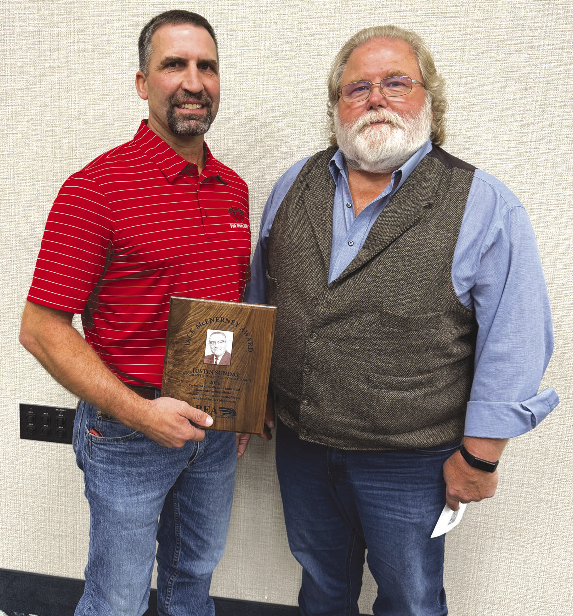 Justin Sunday of Polk County RPPD (Rural Public Power District) was awarded the Jack McEnerney award. He is pictured with retired safety director, Tim Teegerstrom. Photo provided.