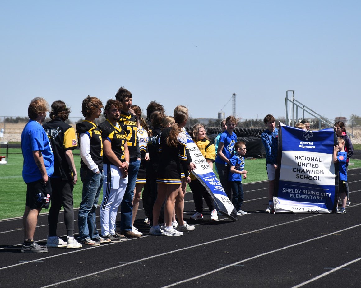 Pictured above are Shelby-Rising City students with their National Unified Champion School banner. PCN photos by Beth Sparrow