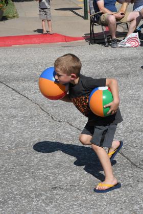 Beach balls were tossed to the crowd Saturday at the Osceola Q150 parade.