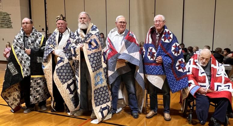Osceola recipients of the Quilts of Valor included Ron Girard, Dave Ienn, Steve Johnson, Gary Mentink, Francis Eugene Bartak, and Steve Hendrickson. PCN photo by Cienna Friesen.