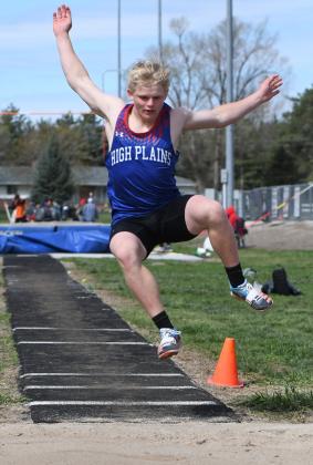 Left: Gage Friesen (HPC) leaped 17 feet for fifth place in long jump