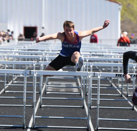 Right: Camden Morris (HPC) clears a hurdle for sixth place. PCN photos by Rick Holtz