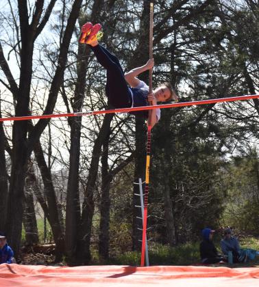 Kylee Krol (CC) vaults over the bar for second place. PCN photo by Beth Sparrow.