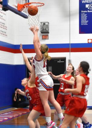 Courtney Carlstrom puts the ball up for a basket against Meridian. PCN photo by Cienna Friesen.