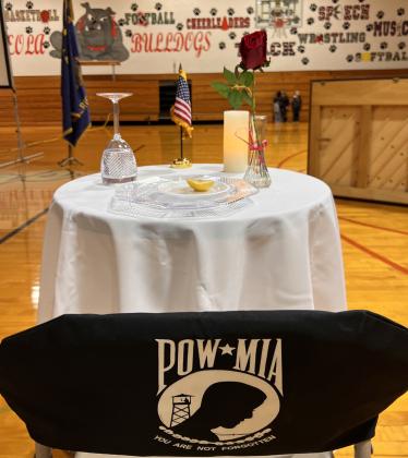 A POW/MIA Table was present at the Veterans Day Service held in the Osceola High School Gymnasium. The tradition has been seen in many Veterans Day programs across the country, and has existed since the end of the Vietnam War.