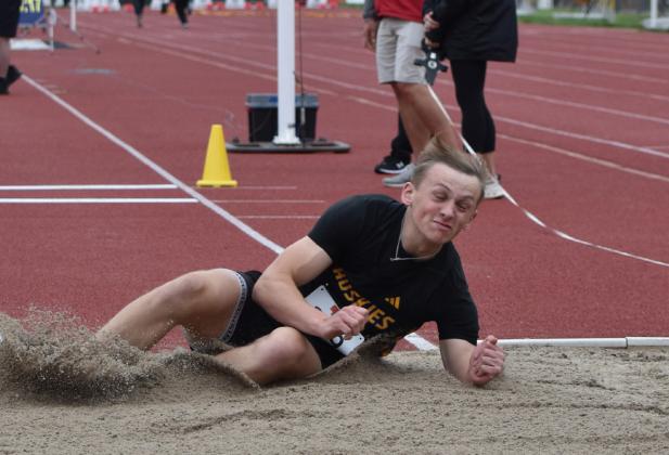 Shelby-RC junior Jett Vrbka hits the sand in the Class C Triple Jump event at the Nebraska State Track and Field Meet this past weekend in Omaha. PCN photo by Beth Sparrow