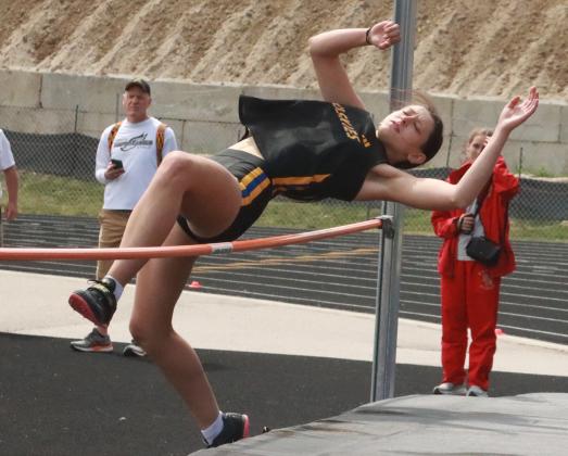 Shelby-RC senior Alexis Wetjen clears 5-1, a personal best at the C-2 District meet in Louisville. Wetjen won the event as she punched her ticket to state. PCN photo by Ken Kush.