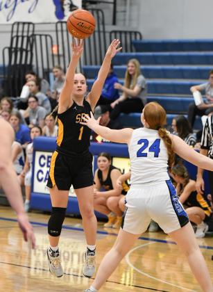 Taya Pinneo takes one to the hoop. PCN photo by Rick Holtz.