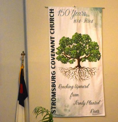 This banner displays the Evangelical Covenant Church’s theme for their 150th. PCN photo by Beth Sparrow.