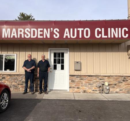 Brothers Roger and Ronal Marsden stand outside Marsden’s Auto Clinic. PCN photo by Cienna Friesen.