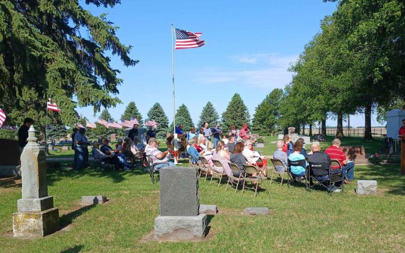 A crowd gathered at Swede Home Cemetery to hear Murray Jones at the annual Memorial Day service on Monday. Photo provided.