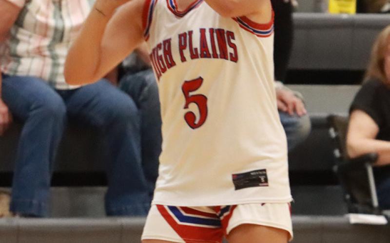 Top left- High Plain’s Gahvi Lesiak sets for the three-point attempt during second quarter action in Osceola on Sunday during the GRC-CRC All-Star Game.