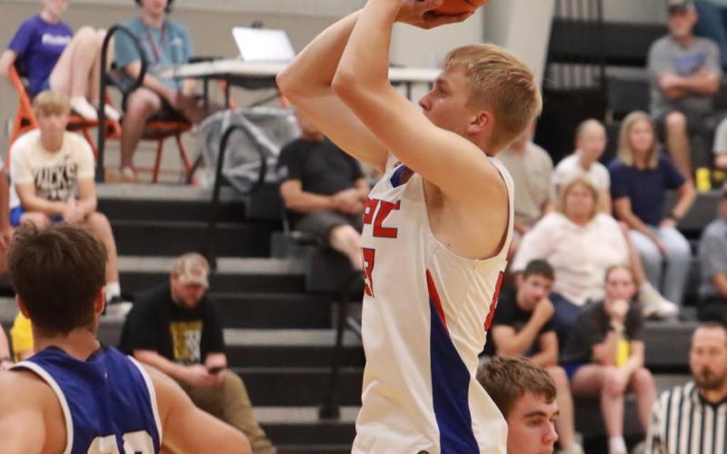 The Storm’s Brodey Spurling elevates for the jump shot over the GRC defense in Sunday’s game at Osceola High School.. Spurling who headed to Doane to play basketball scored seven [points in the game. PCN photo by Ken Kush.