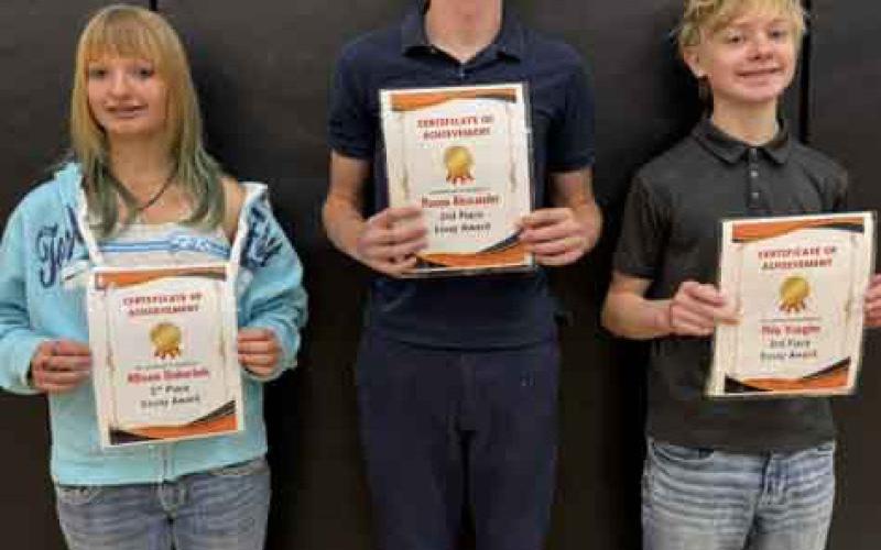 The Osceola Legion Auxiliary awarded some 8th graders for posters and essays. Left are the poppy poster winners: 1st Mason Alexander, 2nd Layton Burritt, 3rd Dawson Baloun. Right are the essay contest winners: 1st Allison Duhachek, Mason Alexander 2nd and 3rd Milo Vaughn. Mason Alexander was also the History award winner. Photos provided.