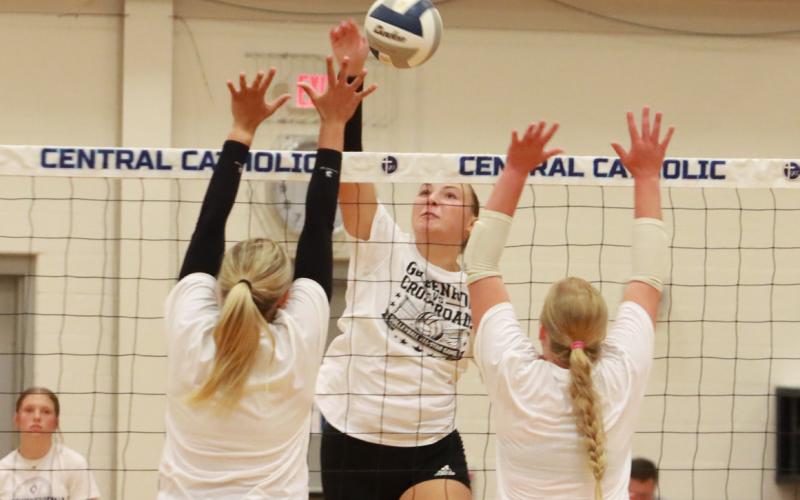 Osceola’s Graci Conkling hammers the kill through the potential block set up by the Goldenrod Conference in Saturday’s game at GICC. Conkling was unofficially credited with 11 kills. PCN photo by Ken Kush.