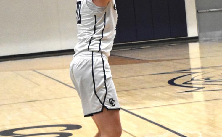 Brock Allen gets ready to shoot a three. PCN file photo by Beth Sparrow.
