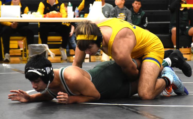 Landon Sliva wrestles an opponent at the Shelby-Rising City invitational. PCN file photo by Beth Sparrow.