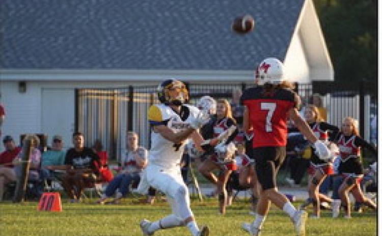 Isaac Whitmore goes for the catch as a Mead defender is close by. PCN photo by Jen Vrbka.