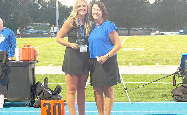 Brea Goodenkauf (left) was inducted into Columbus Lakeview’s athletic hall of fame for her volleyball playing, as well as basketball and track. Photo provided.