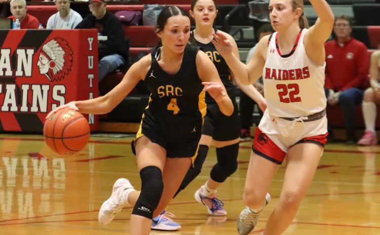 SRC’s only senior Kendall Nickolite (4) drives to the basket with Southern’s Hadlee Maxson (22) defending. Nickolite capped her high school career with three points in the Huskies 46-37 loss. PCN photo by Ken Kush