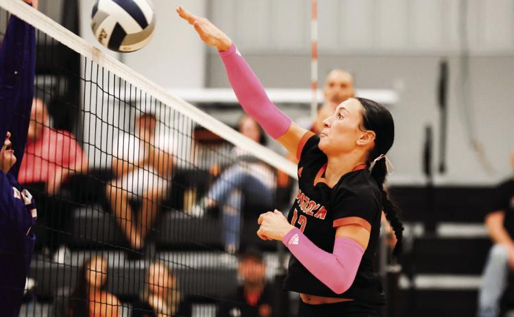 The Bulldogs defense clamped down at the net with 11 blocks, led by Alexis Burritt (pictured here) will eight blocks and 10 kills. PCN by Blaine Winslow