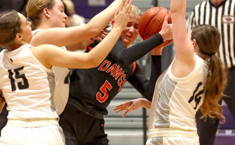 Bulldog junior Kenzie Bartling, fights for the rebound against the Bearcats defense on Thursday night. Bartling turned in 11 rebound performance in the win over SRC on Friday. PCN photo by Blaine Winslow.
