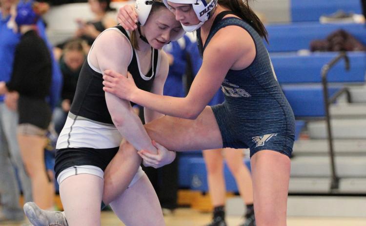 Cross County/Osceola Twisters freshman Piyper Berggren controls her opponent at the Centennial Invite on Saturday in Utica. Berggren went on to a third place finish in the 105 pound weight class to improve to 22-13. PCN photo by Travis Lane