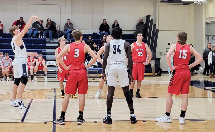 Tanner Hollinger sinks a free throw for Cross County on Friday against Meridian. PCN photo by Beth Sparrow