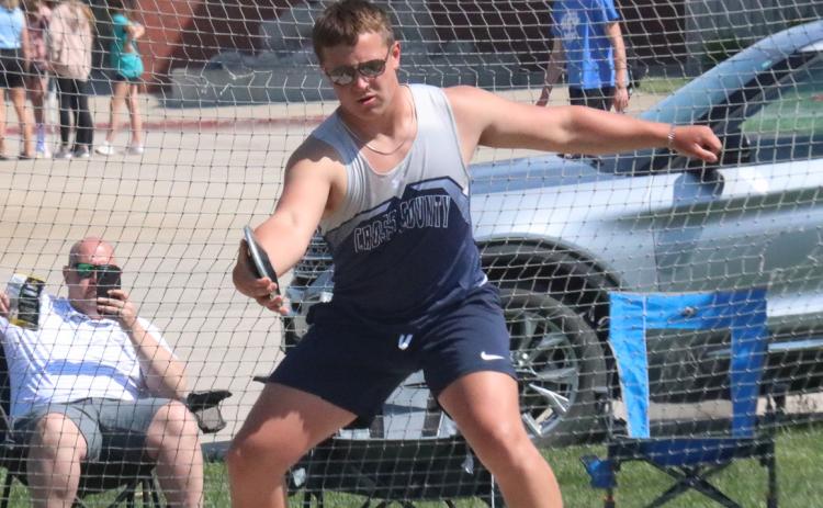 Mason Quilhot threw the discus with a boot on his left foot Thursday at the Cross County Invite. PCN photo by Ken Kush.