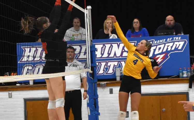 Kendall Nickolite gets a kill against Dorchester. PCN file photo by Beth Sparrow.